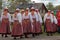 Summer Event. A group of women in national dress perform an Estonian folk dance