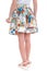 Summer fashion in jeans skirt, with a flower pattern. Back female legs isolated Part of woman body.
