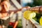 Summer feeling on the balcony: Close up of lampions, smiling girl in the blurry background