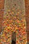 Summer flowers pattern, floral arrangement of different blossoms against brick wall, decoration