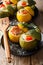 Summer food: yellow and green zucchini baked with fillings close