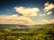 Summer french folk view with a dramatic sky