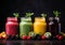 Summer fruit in colorful smoothies in glass bottles. Healthy diet