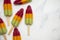 Summer fruit ice lolly popsicle on a marble background