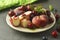 Summer fruit mix - cherry, blueberry, peach. Fruit salad plate. Flat lay with copy space