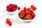 Summer fruits concept strawberry and rasberry in ceramic cup on