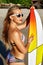 Summer Fun. Leisure Sporting Activity. Surfing. Woman With Surfboard