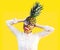 Summer funny pineapple with red lips and comic smile and teeth. Vacation and travel concept.