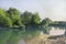 Summer green trees near water and reflections, sandy bank landscape view. Neighborhood of city Bryansk, Bolva river