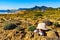 Summer hat on coast and camper rv camp on beach in distance