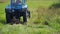 Summer haymaking in meadow