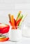 Summer healthy snack appetizer, assorted colorful fresh vegetable sticks (celery, rhubarb, pepper, cucumber and carrot) with
