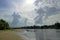 Summer heat. The Pripyat river in July. Clouds and sky.