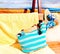 Summer  holiday  banner beach sand women  bikini  and blue bag   with bikini beachwear clothes relaxing sunshine leisure