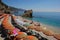 Summer Holiday on Italian Riviera with bright orange green umbrella at Liguria region, Italy