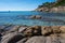 Summer holidays on French Riviera, rocks and sandy beach Escalet near Ramatuelle and Saint-Tropez, Var, France