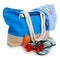 Summer holidays, vacation and travel concept. Beach handbag and accessory travel