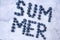 Summer inscription lined from blueberries. Fruits and berries, vegetarian and healthy eating concept. Summer text