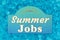 Summer Jobs word message on teal wood sign