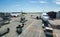 Summer landscape of airfield area with awaiting airplaines