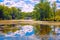 Summer landscape in the Alexander Park of Tsarskoe Selo with a view of the pond and the Large Lamsky Bridge