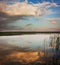 Summer Landscape with Calm Lake at Sunset