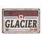 Summer landscape in canadian Glacier national park rusted metal sign