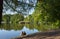 Summer landscape of the city park of the Tavricheskiy Garden with a pond in St. Petersburg