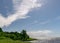 Summer landscape with expressive white clouds, the Baltic Sea coast