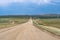 Summer landscape. Federal highway on the steppe coast of Olkhon Island on Lake Baikal in Russia