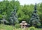 Summer landscape and an Inuksuk also spelled inukshuk,