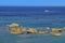Summer landscape. Ionian Sea. Rocks in sea water - Zakynthos Island, landmark attraction in Greece. Seascape
