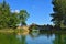 Summer landscape with lake and bridge in Gatchina park,