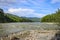 Summer landscape - mountain river Oka Sayanskaya after rains, Siberia, Eastern Sayan, Russia