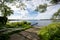 Summer landscape overgrown bank of the russian volga river on a sunny day