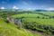 Summer landscape with river, railway and chalk cave monastery i