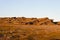 Summer landscape of rocky tundra at sunset