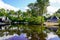 Summer landscape on Talaris Marina in city Lacanau beach lake between pine trees on the sandy beach