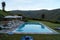 Summer landscape in Tuscany, swimming pool at a rural estate, Chianti, Italy