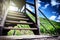 Summer landscape with vineyard and stairs to watch tower