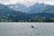 Summer landscaped, family sailing boat in lake with mountain view at Hallstatt, Austria in summer