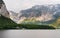 Summer landscaped, Lake with green forests and mountain at Hallstatt, Austria in sunrise