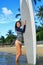 Summer Leisure Sport Activity. Happy Woman With Surfboard On Beach.