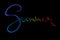 Summer lettering word written with white smoke or flame light in rainbow color isolated on black background