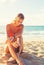 Summer Lifestyle, Happy Carefree Young Woman at the Beach