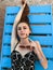 Summer lifestyle portrait of young stunning woman lying on the sunbed on the beach