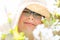 Summer little girl in straw hat outdoor portrait.