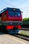 Summer.Locomotive goes on rails. Russian train. Russian railway
