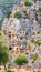 Summer mediterranean cityscape - view of the ruins of ancient Greek tombs in the ancient city of Myra, near the Turkish town of De