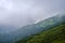 Summer misty morning cloudy Carpathian Mountains Chornohora range, Ukraine